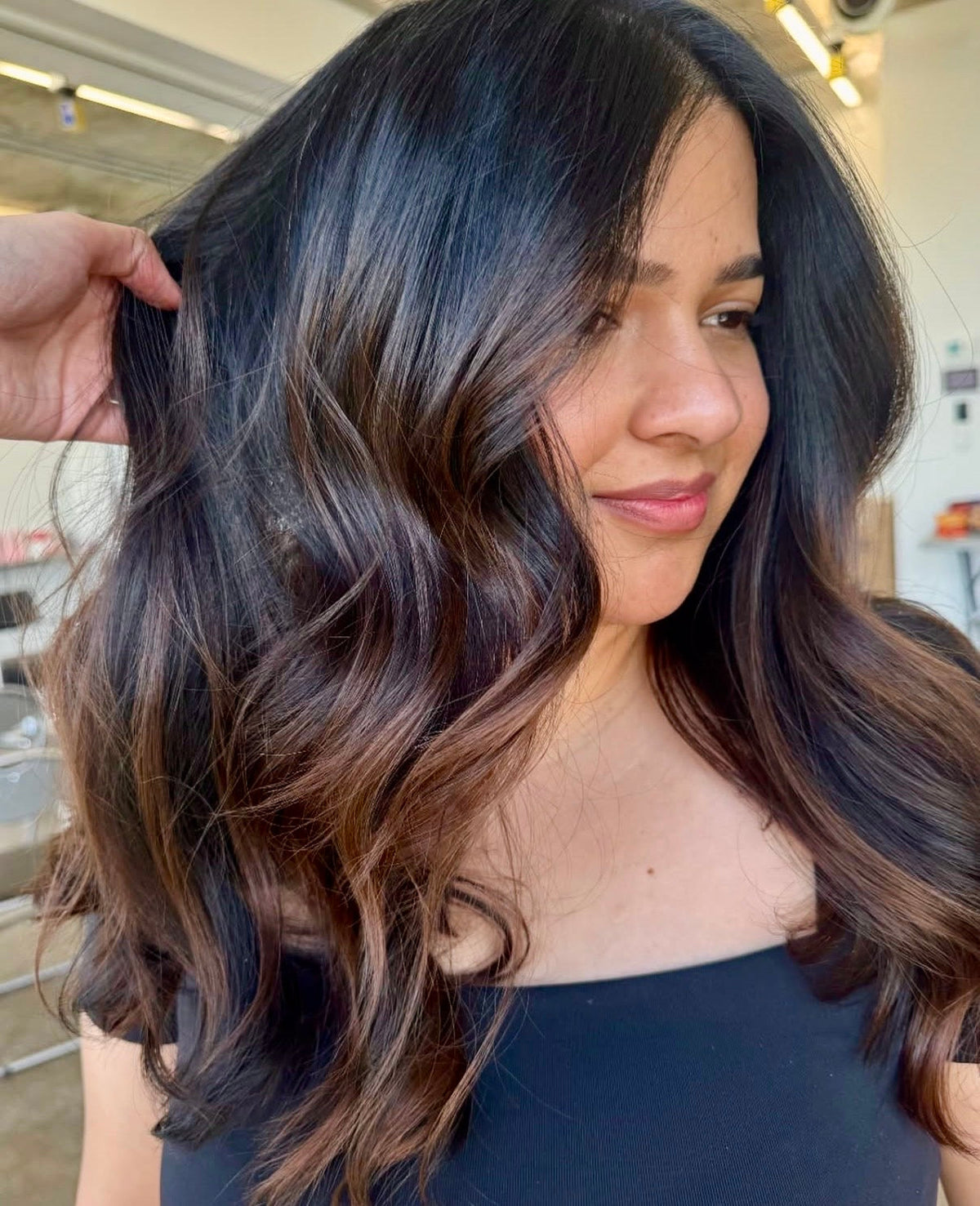 Beautiful dimensional hair colour created by Curious Salons Aspen Landing in Calgary, Alberta.