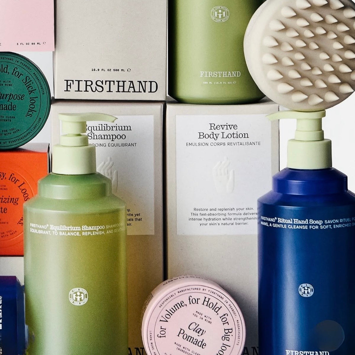 Firsthand Supply grooming bottles and tubs with a brush