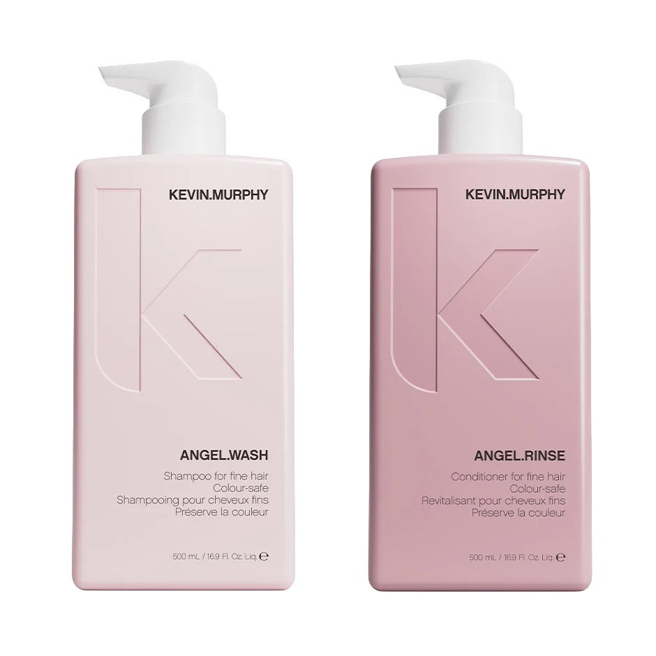 Two Kevin Murphy haircare bottles on a white background: Angel Wash shampoo in a pale pink bottle with a white pump, and Angel Rinse conditioner in a slightly deeper pink bottle with a white pump.