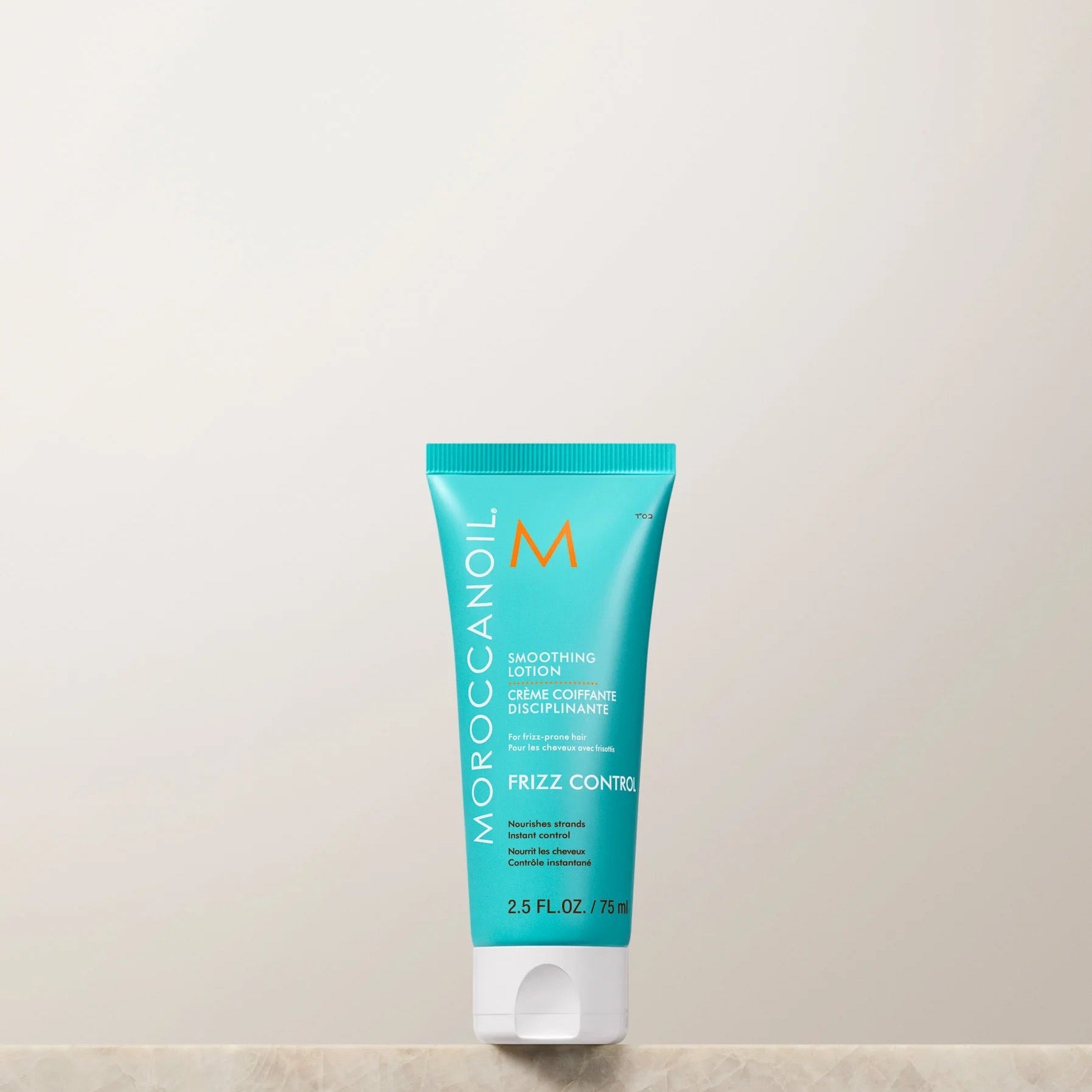 Moroccanoil Smoothing Lotion frizz control styling cream Canada 2.5ml size
