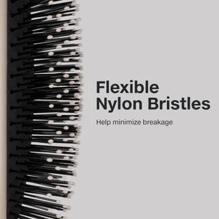 Close-up of a brush with flexible nylon bristles on a gray background, featuring text about bristle type. Paul Mitchell Detangling Brush for wet and dry hair detangling in Canada