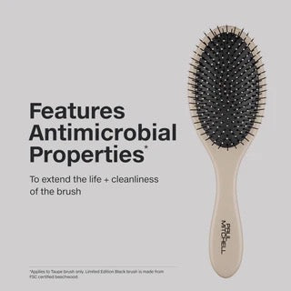 Hairbrush with text highlighting antimicrobial properties on a light gray background Paul Mitchell Detangling Brush for wet and dry hair detangling in Canada