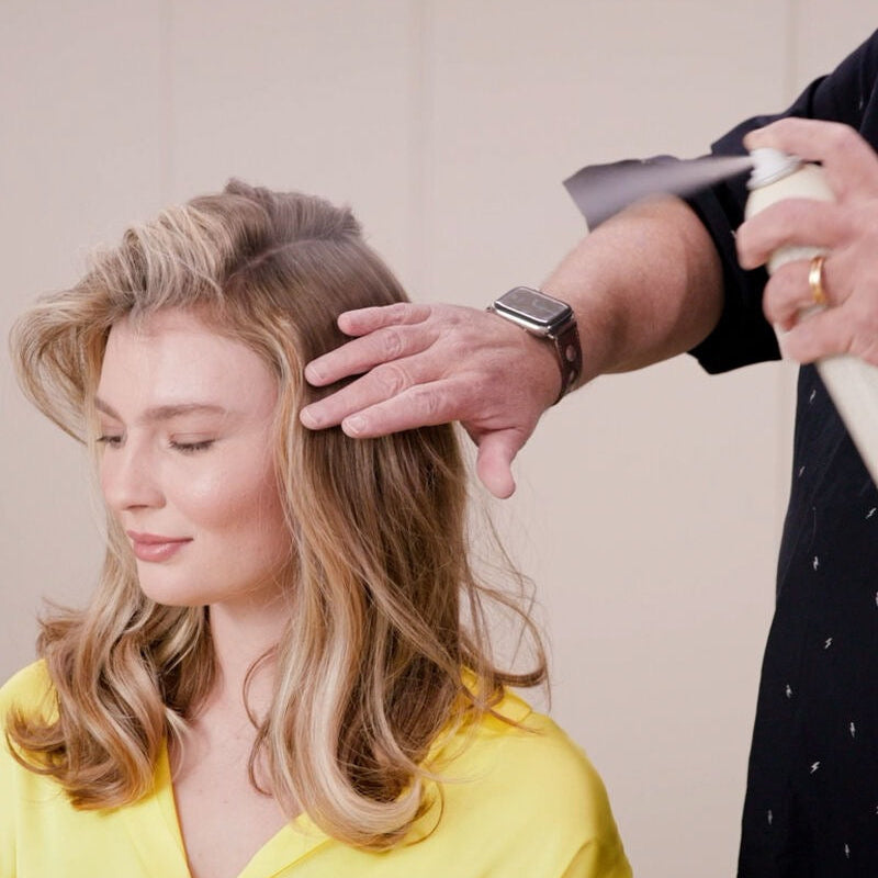 Woman getting her hair styled by a Kevin Murphy FRESH.HAIR Dry Shampoo for oil control and volume in Canada