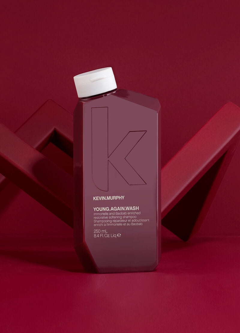 Kevin Murphy YOUNG.AGAIN.WASH restorative softening shampoo for dry brittle hair in Canada at Curious Salons red barckground