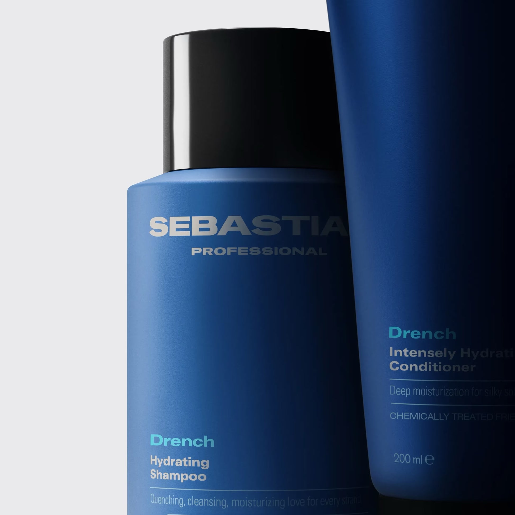 Two blue bottles of Sebastian Professional shampoo and conditioner on a light gray background