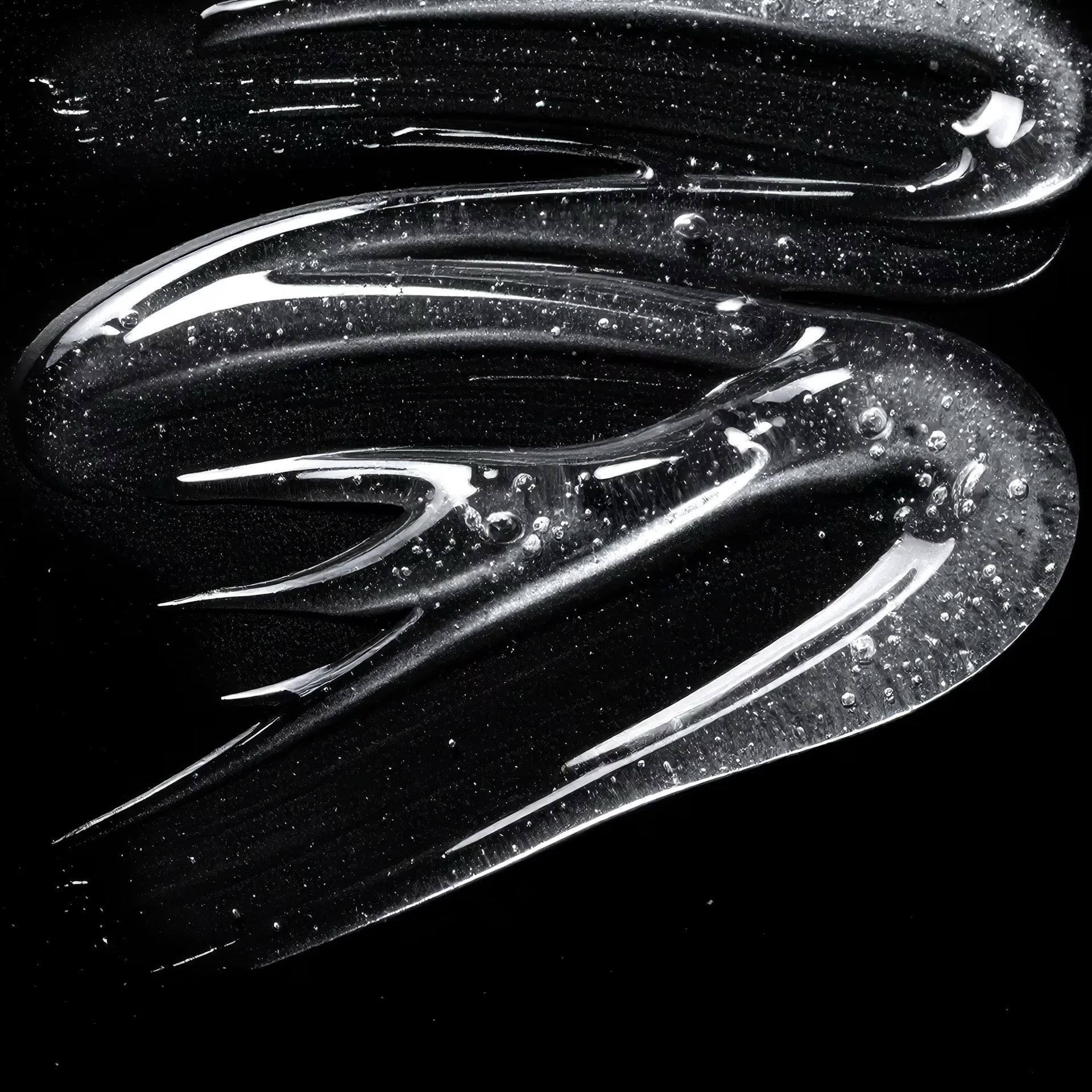 Black and white texture of a smooth surface with wavy patterns