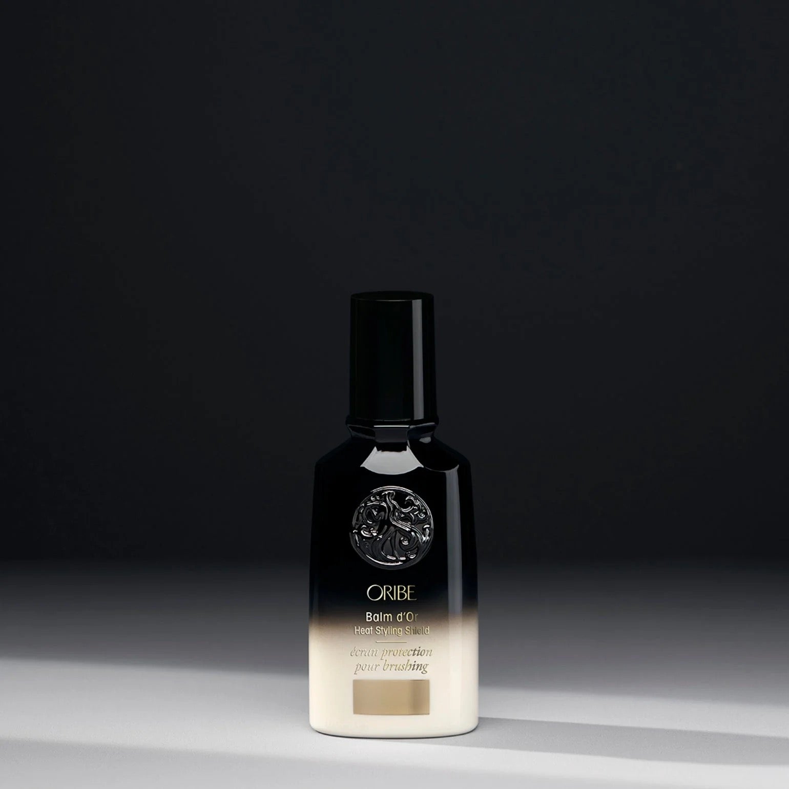 Balm d’Or Heat Styling Shield by Oribe – 450°F Protection & Sleek Finish
