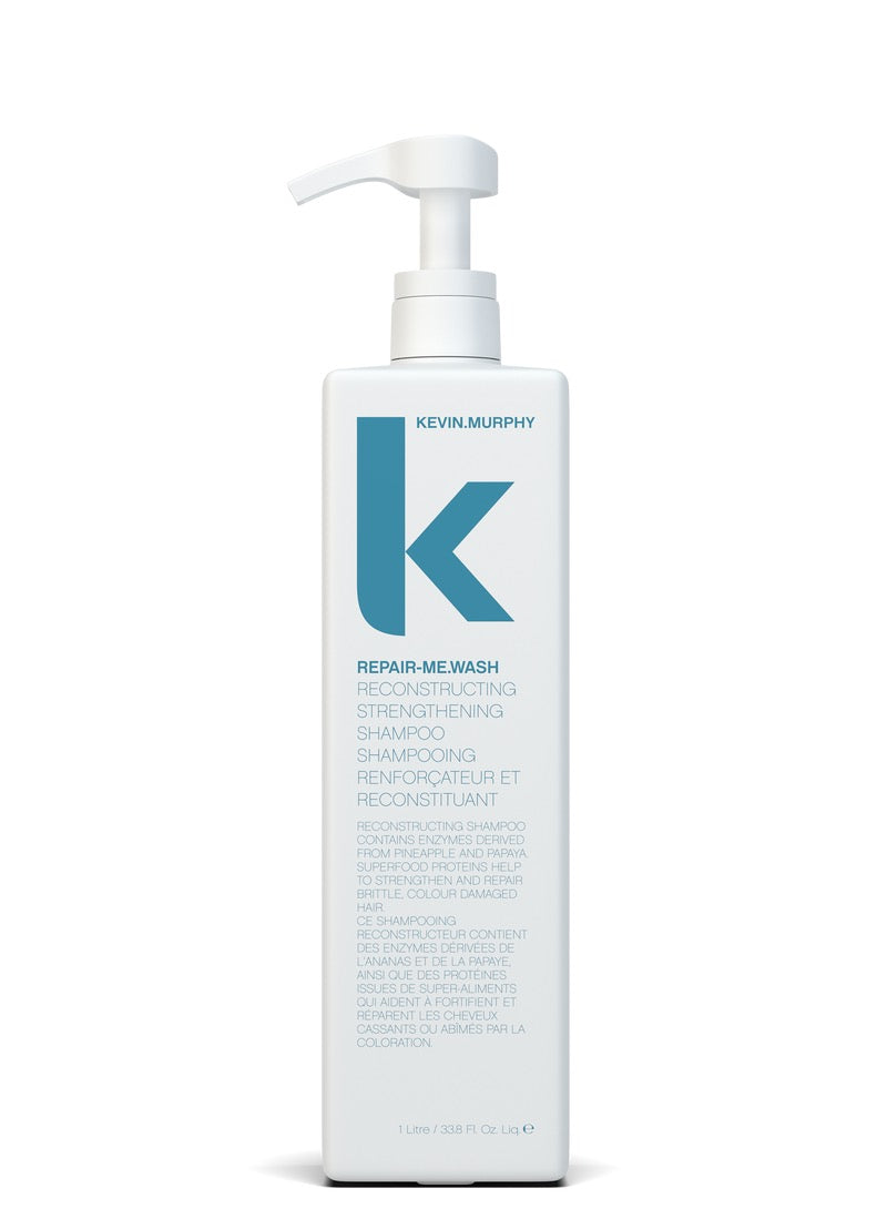 A white pump bottle of Kevin Murphy Repair-Melwash Recristallizing Strengthening Shampoo, featuring a large teal 'K' logo on a clean white background.