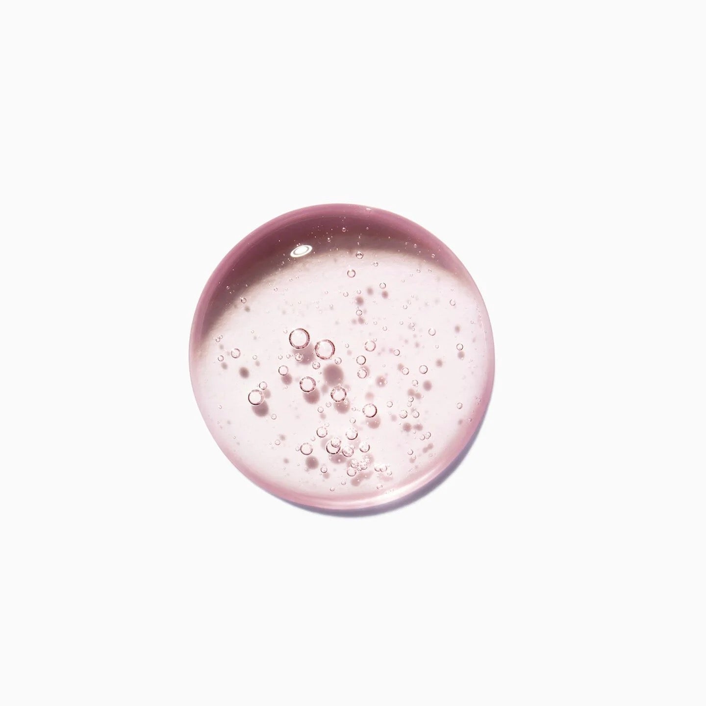 Droplets of Kérastase Chroma Absolu Bain Riche Chroma Respect Shampoo for colour-treated hair in Canada at Curious Salons 
