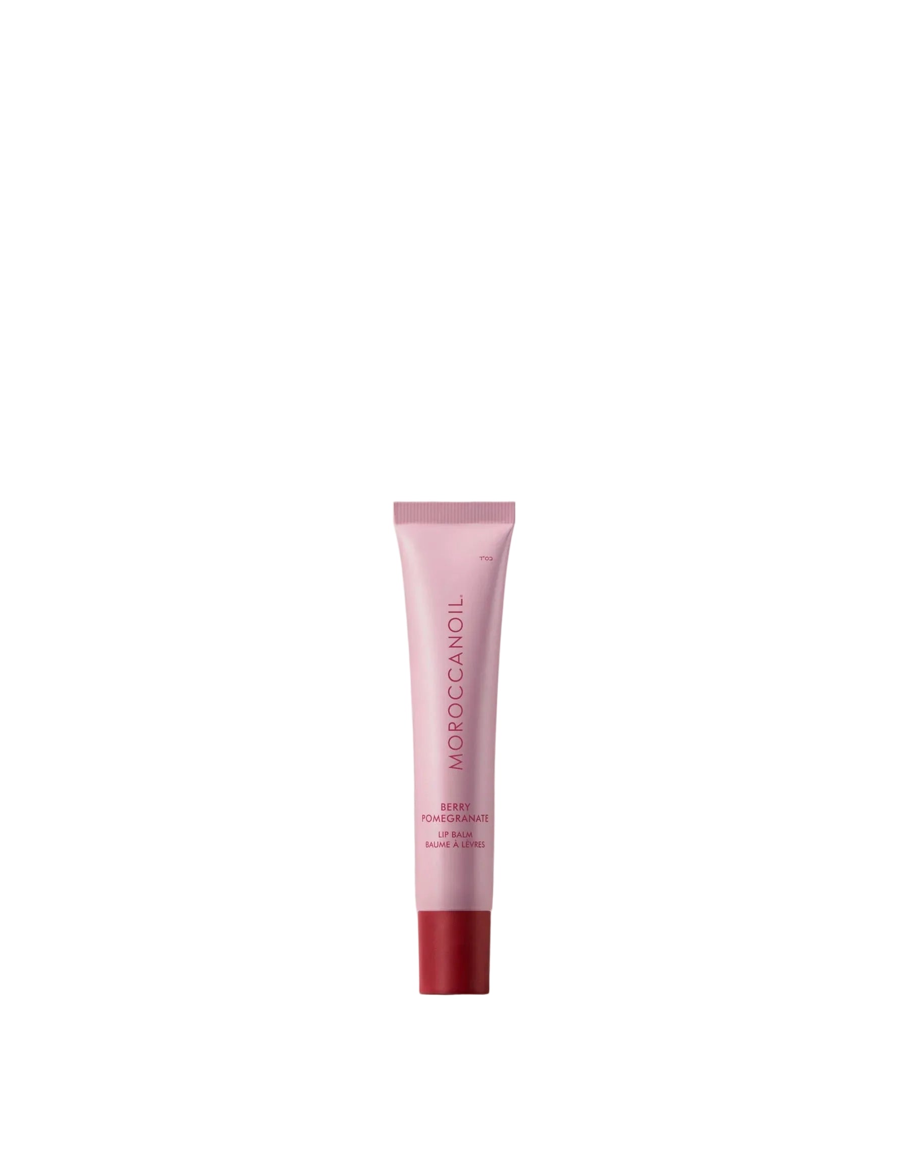 Pink skincare tube with red base on a white background