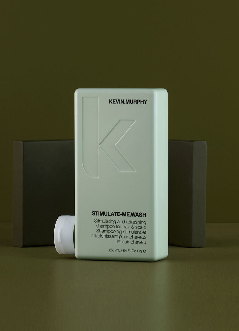 Kevin Murphy shampoo bottle on a green background