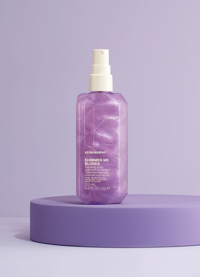Purple hair care product bottle on a purple platform with a light purple background Canada