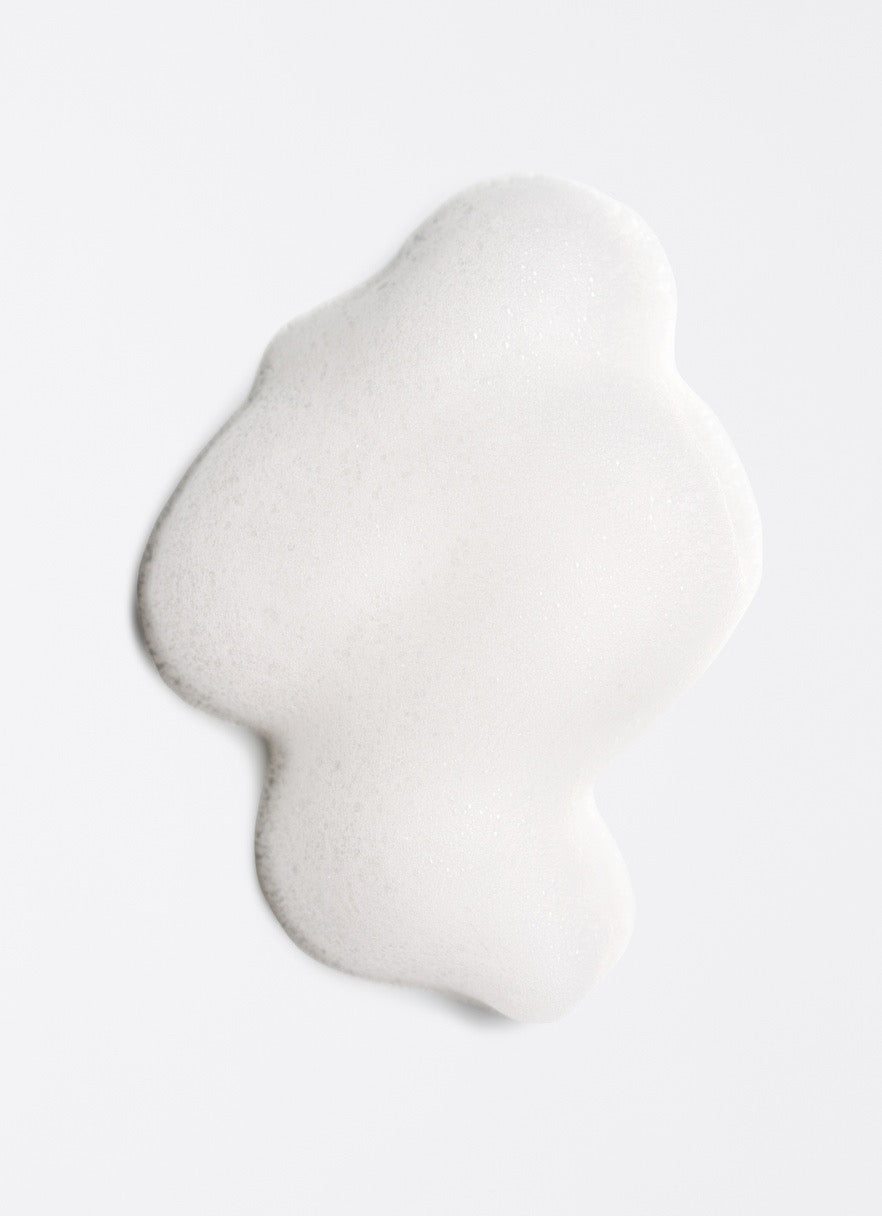 White, wavy-textured object on a white background