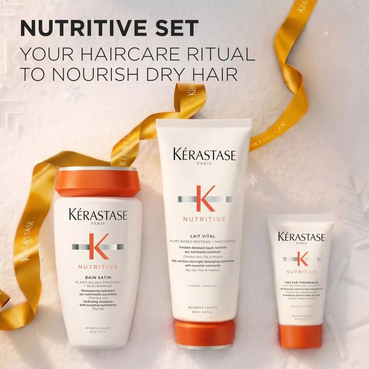 Three Kérastase Paris Nutritive haircare products arranged on a light textured background with a gold ribbon: a Bain Satin shampoo bottle, a Laté Vital conditioner tube, and a Detree Treatment spray bottle. Large text at the top reads 'NUTRITIVE SET' and 'YOUR HAIRCARE RITUAL TO NOURISH DRY HAIR.
