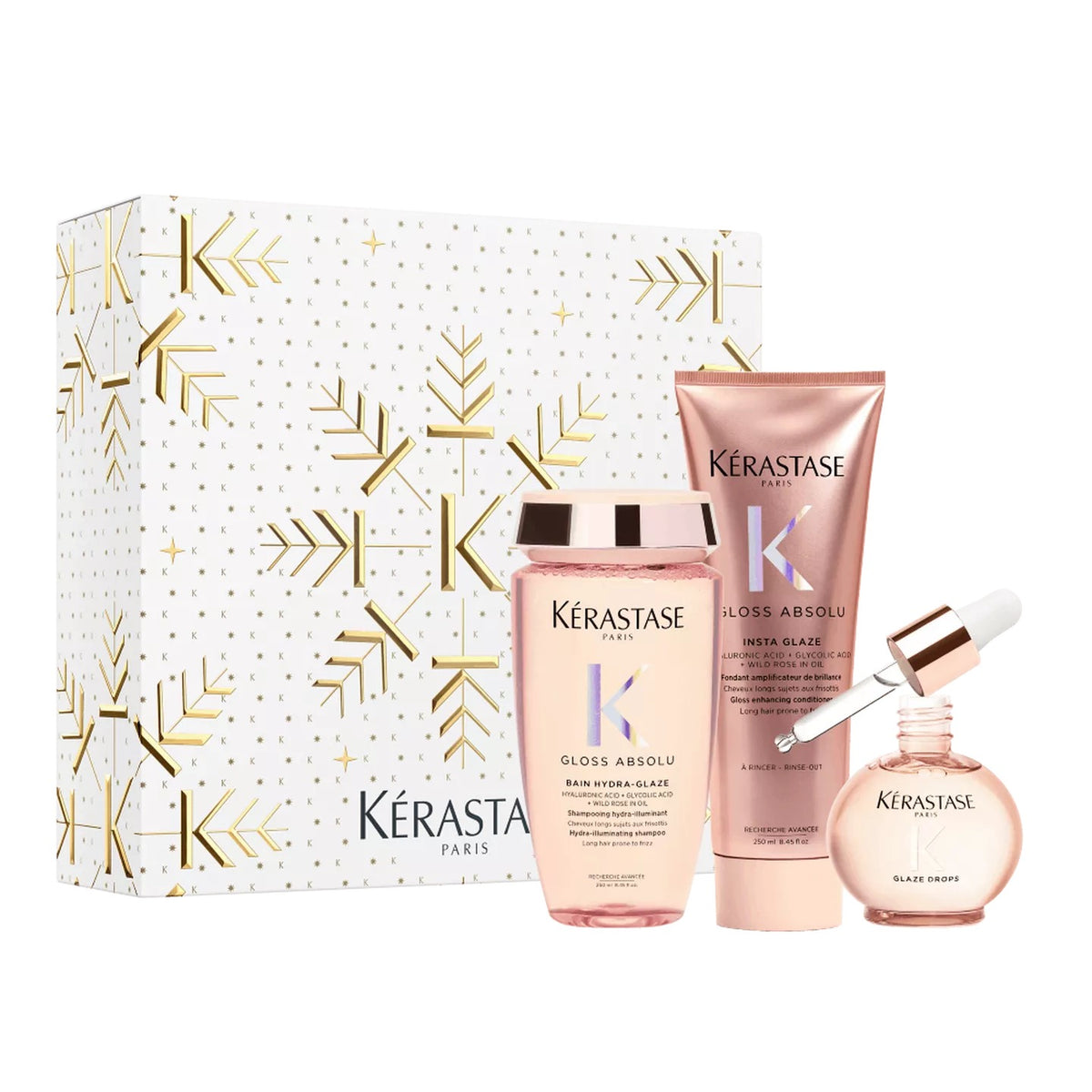 Kérastase Gloss Absolu haircare gift set featuring a white box with gold snowflake patterns,Curious Salons Canada