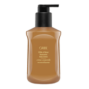 Oribe Cète d'Azur Restorative Body Crème bottle on a transparent at Curious Salons background