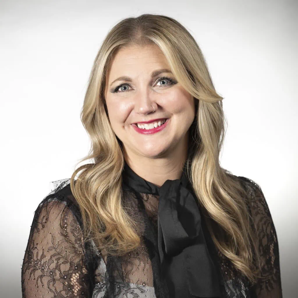 Claire Rodgers, hairstylist and manager specializing in colour and blonding services.