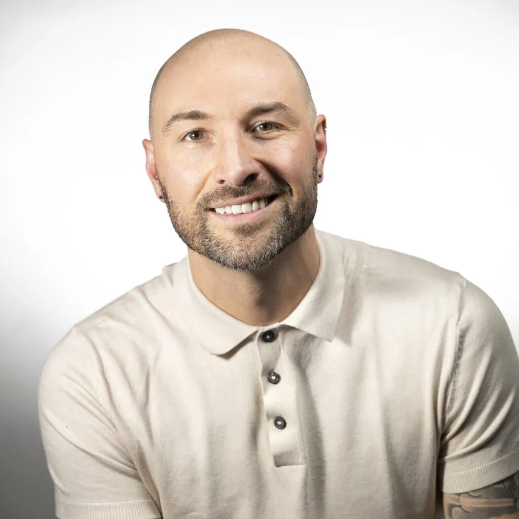 Tony Allocca, salon owner and stylist specializing in precise cuts and classic styles.